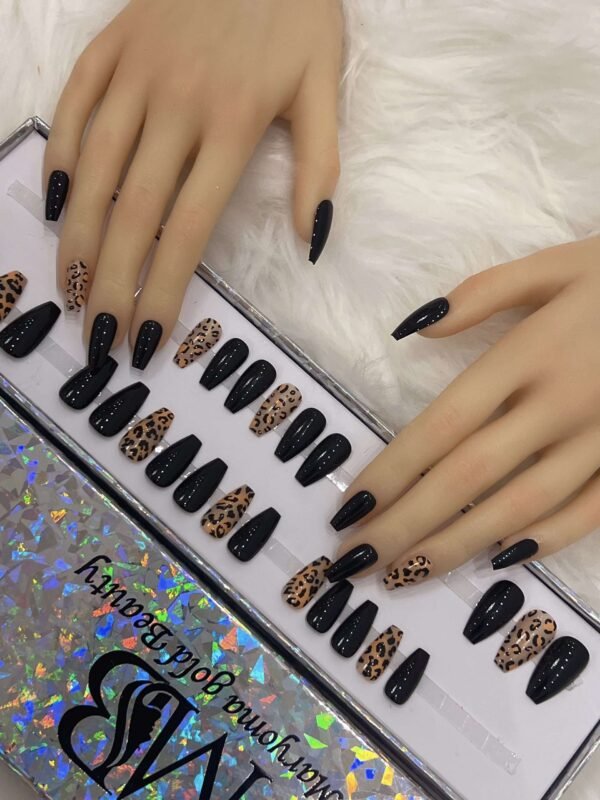 glossy black coffin with tiger design