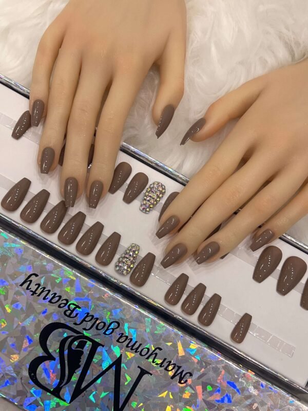 medium brown coffin with crystal
