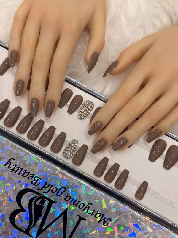 medium brown coffin with crystal