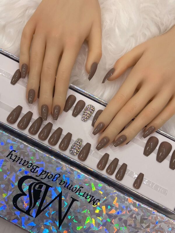 medium brown coffin with crystal