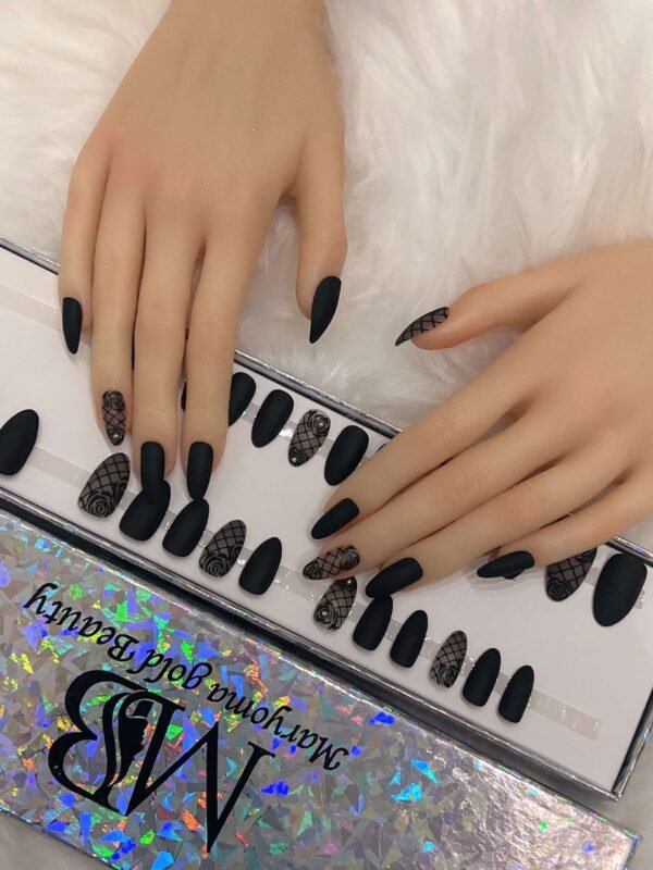 black matt sharp with leaves nail art