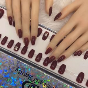 maroon coffin with crystal
