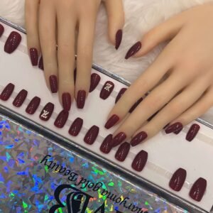 maroon coffin with crystal