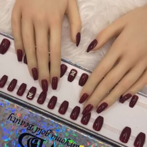 maroon coffin with crystal