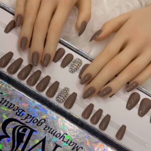 medium brown coffin with crystal
